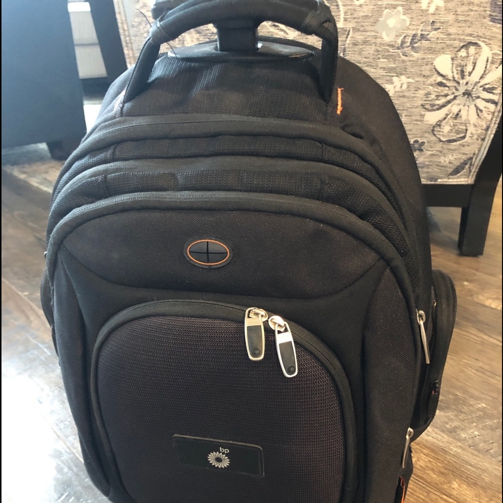 Rolling back pack with lots of pockets